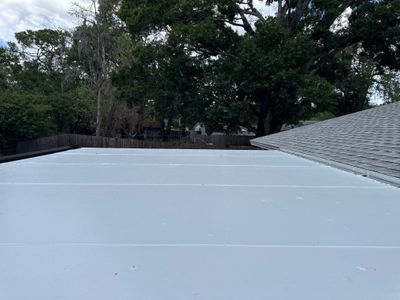 Wide view of room addition roof installation