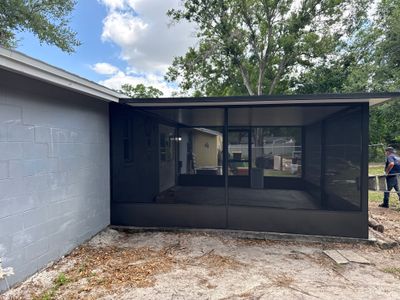 Screen room addition exterior wide view by Drome Contracting